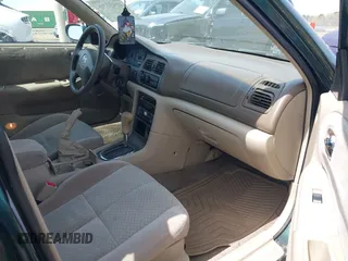 2001 Mazda 626 LX with VIN 1YVGF22D915241384, listed as a IAAI auction lot 41927705 with 231,801 mi miles. Bid and sale history available at carsss.com. Image 5.