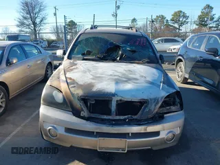 2004 Kia Sorento LX with VIN KNDJC733945268452, listed as a IAAI auction lot 41273839 with 1 mi miles. Bid and sale history available at carsss.com. Image 6.