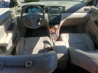 2003 Toyota Corolla CE with VIN 1NXBR38E33Z084761, listed as a Copart auction lot 55859545 with 205,938 mi miles and Salvage Title. Bid and sale history available at DreamBid. Image 8.