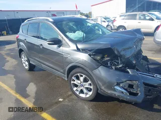 2015 Ford Escape Titanium with VIN 1FMCU0JX1FUB92412, listed as a IAAI auction lot 41893933 with 95,306 mi miles. Bid and sale history available at carsss.com. Image 1.