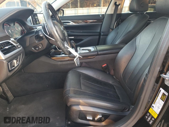 2017 BMW 7 Series 740i xDrive with VIN WBA7E4C55HGU99795, listed as a Copart auction lot 85545124 with 99,304 mi miles and Salvage Title. Bid and sale history available at carsss.com. Image 7.