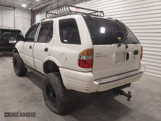 1998 Isuzu Rodeo S with VIN 4S2CM58W8W4363868, listed as a IAAI auction lot 42073264 with 204,885 mi miles. Bid and sale history available at carsss.com. Image 3.