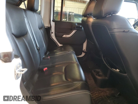 2015 Jeep Wrangler Unlimited Altitude с VIN 1C4HJWEG3FL559879, выставлен на аукционе Copart как лот 61054505 с пробегом 100 123 миль миль и На запчасти • Non repairable. История ставок и продаж доступна на DreamBid. Изображение 11.