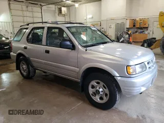 2000 Isuzu Rodeo z VIN 4S2DM58WXY4346884, wystawiony jako Copart lot #43108675 z przebiegiem 144 306 mil mil oraz Nie do naprawy. Historia ofert i sprzedaży dostępna na DreamBid. Obrazek 4.