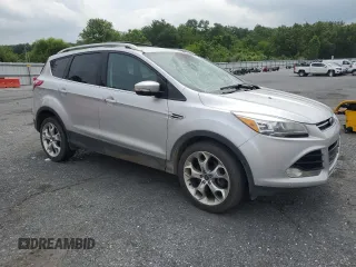 2013 Ford Escape Titanium with VIN 1FMCU9J9XDUB88989, listed as a Copart auction lot 64994445 with 192,833 mi miles and Salvage title. Bid and sale history available at DreamBid. Image 4.
