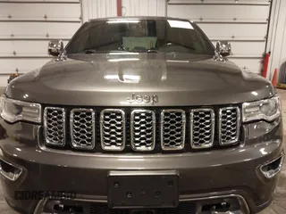 2017 Jeep Grand Cherokee Overland z VIN 1C4RJFCG6HC641812, wystawiony jako IAAI lot #42053404 z przebiegiem 129 184 mil mil oraz . Historia ofert i sprzedaży dostępna na DreamBid. Obrazek 6.