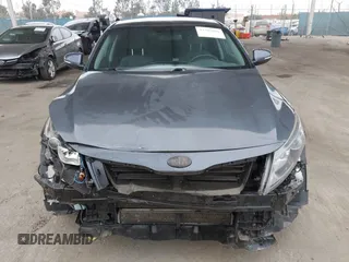 2014 Kia Optima LX z VIN KNAGM4AD8E5065584, wystawiony jako IAAI lot #42287890 z przebiegiem 134 565 mil mil oraz . Historia ofert i sprzedaży dostępna na DreamBid. Obrazek 12.