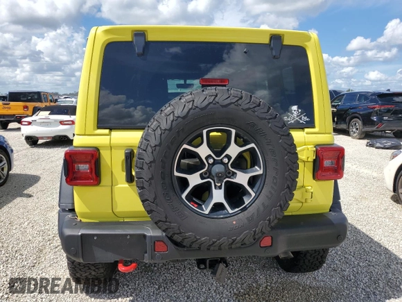 2022 Jeep Wrangler Unlimited Rubicon with VIN 1C4HJXFG3NW214174, listed as a Copart auction lot 74136484 with 5,292 mi miles and Salvage title. Bid and sale history available at DreamBid. Image 6.