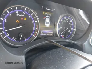 2015 Infiniti Q50 Premium z VIN JN1BV7AR2FM423666, wystawiony jako IAAI lot #41345228 z przebiegiem 67 027 mil mil oraz . Historia ofert i sprzedaży dostępna na DreamBid. Obrazek 15.