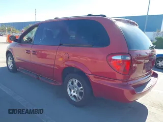 2001 Dodge Grand Caravan with VIN 2B4GT44L31R196487, listed as a IAAI auction lot 41762495 with 164,571 mi miles and . Bid and sale history available at DreamBid. Image 3.
