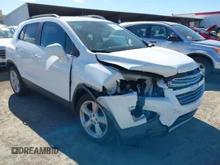 2015 Chevrolet Trax LTZ with VIN 3GNCJTSB2FL232354, listed as a IAAI auction lot 41701356 with 126,947 mi miles. Bid and sale history available at carsss.com. Image 1.