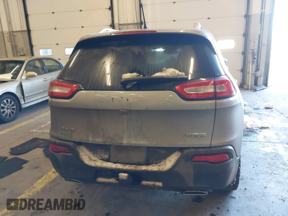 2015 Jeep Cherokee Latitude with VIN 1C4PJMCS5FW510298, listed as a IAAI auction lot 41518453 with 99,568 mi miles and . Bid and sale history available at DreamBid. Image 17.