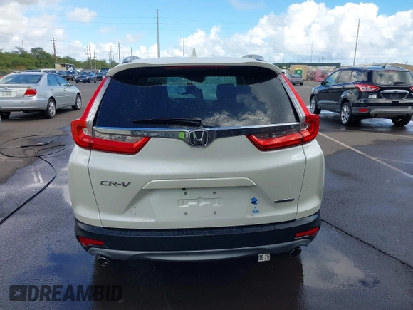 2018 Honda CR-V Touring with VIN 2HKRW1H96JH506435, listed as a IAAI auction lot 41228873 with 11,585 mi miles and . Bid and sale history available at DreamBid. Image 17.