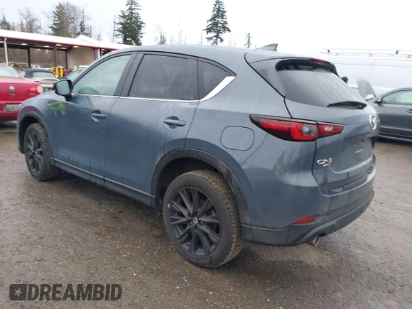 2023 Mazda CX-5 2.5 S Carbon Edition with VIN JM3KFBCM3P0133600, listed as a IAAI auction lot 41693803 with 42,323 mi miles. Bid and sale history available at carsss.com. Image 3.