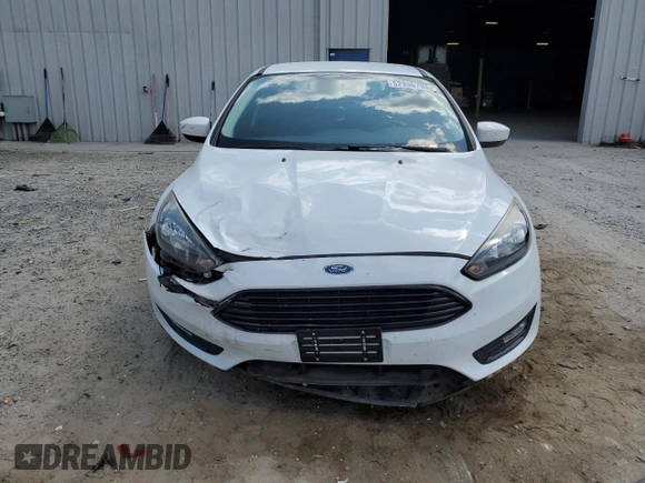 2018 Ford Focus SE with VIN 1FADP3FE5JL220077, listed as a Copart auction lot 52395795 with 87,785 mi miles and Salvage Title. Bid and sale history available at carsss.com. Image 5.