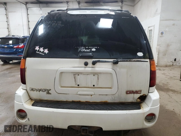 2003 GMC Envoy SLT с VIN 1GKET16S736148082, выставлен на аукционе Copart как лот 53889665 с пробегом 179 774 миль миль и Чистый • Clean title. История ставок и продаж доступна на DreamBid. Изображение 6.