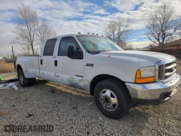1999 Ford F-350 XL z VIN 1FTWW32F4XED65158, wystawiony jako Copart lot #41690765 z przebiegiem 147 314 mil mil oraz Czysty tytuł • Clean title. Historia ofert i sprzedaży dostępna na DreamBid. Obrazek 1.