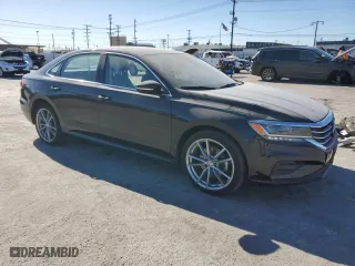 2020 Volkswagen Passat 2.0T SE with VIN 1VWSA7A31LC016120, listed as a Copart auction lot 39723313 with 51,619 mi miles. Bid and sale history available at carsss.com. Image 4.