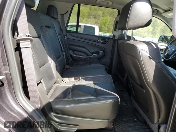 2015 Chevrolet Tahoe LT z VIN 1GNSKBKC6FR156951, wystawiony jako Copart lot #54666335 z przebiegiem 156 139 mil mil oraz Szkoda całkowita • Salvage title. Historia ofert i sprzedaży dostępna na DreamBid. Obrazek 11.
