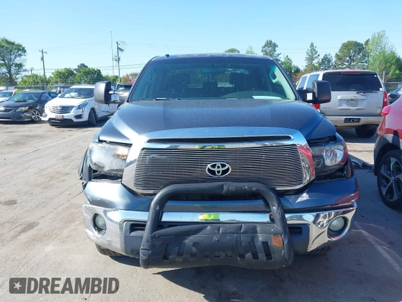 2010 Toyota Tundra with VIN 5TFEY5F11AX097360, listed as a IAAI auction lot 41990256 with 350,830 mi miles and . Bid and sale history available at DreamBid. Image 12.