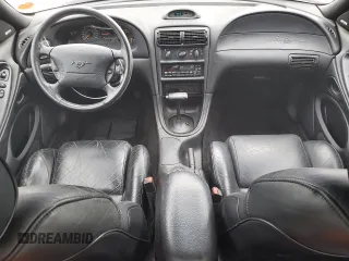 1996 Ford Mustang GT z VIN 1FALP42X8TF196321, wystawiony jako Copart lot #50874885 z przebiegiem 86 945 mil mil oraz Szkoda całkowita • Salvage title. Historia ofert i sprzedaży dostępna na DreamBid. Obrazek 8.