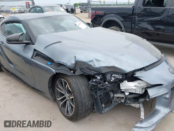 2021 Toyota Supra 2.0 with VIN WZ1DB2C0XMW038679, listed as a IAAI auction lot 42407988 with 76,316 mi miles and . Bid and sale history available at DreamBid. Image 6.