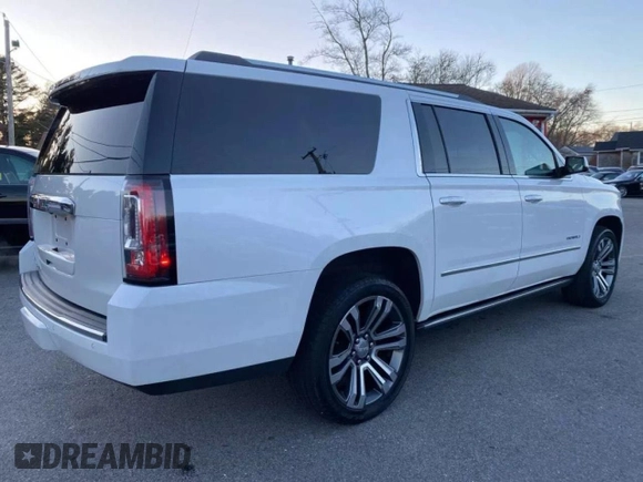 2020 GMC Yukon XL Denali with VIN 1GKS2HKJ6LR272614, listed as a Copart auction lot 48620095 with 107,217 mi miles and Clean Title. Bid and sale history available at carsss.com. Image 4.