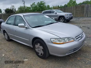 2002 Honda Accord LX z VIN 1HGCG16402A048301, wystawiony jako IAAI lot #42196218 z przebiegiem 254 138 mil mil oraz . Historia ofert i sprzedaży dostępna na DreamBid. Obrazek 1.