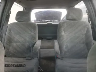 2002 Honda Odyssey EX z VIN 5FNRL18652B014929, wystawiony jako Copart lot #57185775 z przebiegiem 291 807 mil mil oraz Czysty tytuł • Clean title. Historia ofert i sprzedaży dostępna na DreamBid. Obrazek 10.