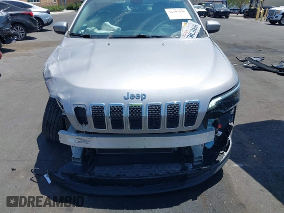 2019 Jeep Cherokee Latitude z VIN 1C4PJLCB8KD241701, wystawiony jako IAAI lot #42407536 z przebiegiem 59 006 mil mil oraz . Historia ofert i sprzedaży dostępna na DreamBid. Obrazek 13.