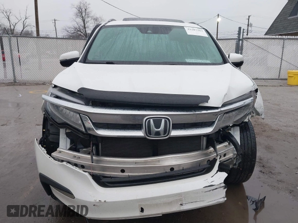 2021 Honda Pilot Touring 8-Passenger z VIN 5FNYF6H90MB031795, wystawiony jako IAAI lot #41207263 z przebiegiem 56 367 mil mil oraz . Historia ofert i sprzedaży dostępna na DreamBid. Obrazek 13.