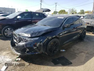 2019 Buick Regal Essence with VIN W04GP6SX0K1030338, listed as a Copart auction lot 74726264 with 148,531 mi miles and Salvage title. Bid and sale history available at DreamBid. Image 1.