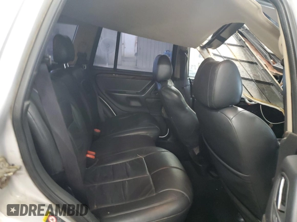 2002 Jeep Grand Cherokee Limited z VIN 1J8GW58S02C279251, wystawiony jako Copart lot #61563465 z przebiegiem 182 244 mil mil oraz Szkoda całkowita • Salvage title. Historia ofert i sprzedaży dostępna na DreamBid. Obrazek 11.