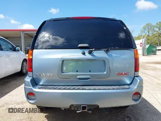2006 GMC Envoy SLE with VIN 1GKDS13S362310613, listed as a IAAI auction lot 41881880 with 202,893 mi miles. Bid and sale history available at carsss.com. Image 16.