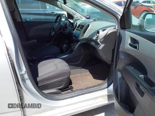 2014 Chevrolet Sonic LT with VIN 1G1JC5SH0E4210327, listed as a IAAI auction lot 42069313 with 94,506 mi miles and . Bid and sale history available at DreamBid. Image 5.
