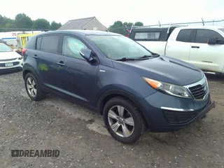 2013 Kia Sportage LX with VIN KNDPBCA20D7380903, listed as a IAAI auction lot 42577970 with 112,689 mi miles and . Bid and sale history available at DreamBid. Image 1.