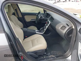 2017 Volvo S60 Dynamic with VIN YV126MFL4H2430687, listed as a IAAI auction lot 41577059 with 57,027 mi miles. Bid and sale history available at carsss.com. Image 5.
