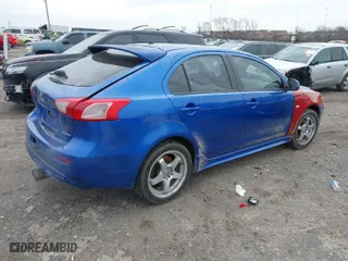 2010 Mitsubishi Lancer GTS with VIN JA32X8HW1AU005888, listed as a IAAI auction lot 41497454 with 217,023 mi miles. Bid and sale history available at carsss.com. Image 4.