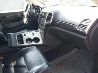 2011 Jeep Grand Cherokee Laredo with VIN 1J4RR4GG5BC512095, listed as a IAAI auction lot 42156490 with 160,749 mi miles. Bid and sale history available at carsss.com. Image 5.