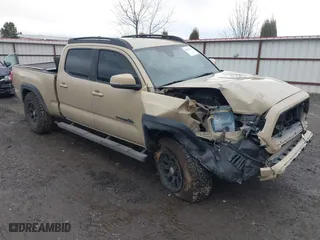 2019 Toyota Tacoma 4WD SR5 with VIN 3TMDZ5BN8KM061383, listed as a IAAI auction lot 41657160 with 72,293 mi miles. Bid and sale history available at carsss.com. Image 1.