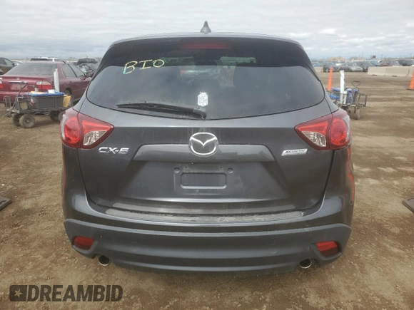2014 Mazda CX-5 Touring with VIN JM3KE2CYXE0357272, listed as a Copart auction lot 52587565 with 139,937 mi miles and Clean Title. Bid and sale history available at carsss.com. Image 6.