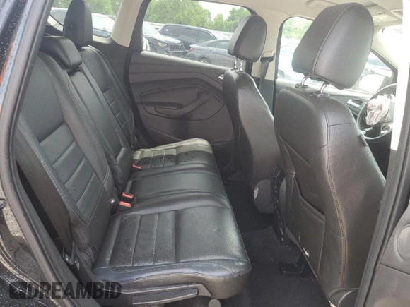 2015 Ford Escape Titanium with VIN 1FMCU9J91FUA38787, listed as a Copart auction lot 59749735 with 132,536 mi miles and Salvage title. Bid and sale history available at DreamBid. Image 11.