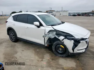 2018 Mazda CX-5 Touring z VIN JM3KFACM0J0469433, wystawiony jako Copart lot #54349955 z przebiegiem Nie podano mil oraz Szkoda całkowita • Salvage title. Historia ofert i sprzedaży dostępna na DreamBid. Obrazek 4.