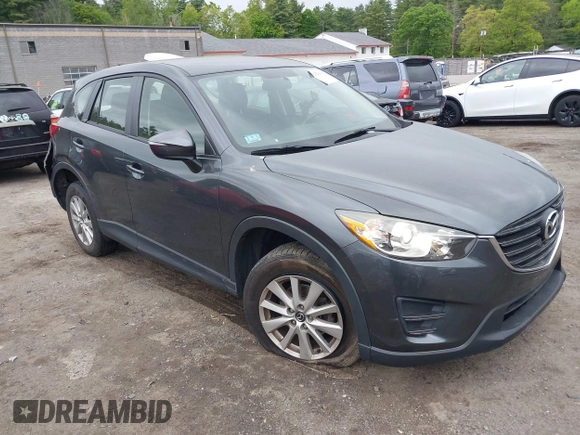 2016 Mazda CX-5 Sport with VIN JM3KE4BY9G0710004, listed as a IAAI auction lot 42323434 with 83,320 mi miles and . Bid and sale history available at DreamBid. Image 13.