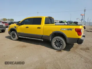 2016 Nissan Titan XD PRO-4X with VIN 1N6BA1F43GN506115, listed as a Copart auction lot 74916444 with 157,268 mi miles and Salvage Title. Bid and sale history available at carsss.com. Image 2.