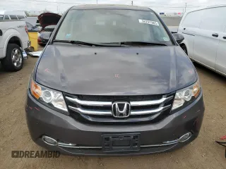 2015 Honda Odyssey Touring Elite z VIN 5FNRL5H96FB047204, wystawiony jako Copart lot #56297985 z przebiegiem 125 482 mil mil oraz Szkoda całkowita • Salvage title. Historia ofert i sprzedaży dostępna na DreamBid. Obrazek 5.