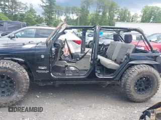 2008 Jeep Wrangler Unlimited Sahara with VIN 1J4GA59138L501621, listed as a IAAI auction lot 42245134 with 241,361 mi miles and . Bid and sale history available at DreamBid. Image 14.