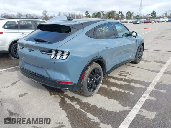 2023 Ford Mustang Mach-E Premium z VIN 3FMTK3SU1PMA84387, wystawiony jako IAAI lot #41913897 z przebiegiem 4180 mil mil oraz . Historia ofert i sprzedaży dostępna na DreamBid. Obrazek 4.