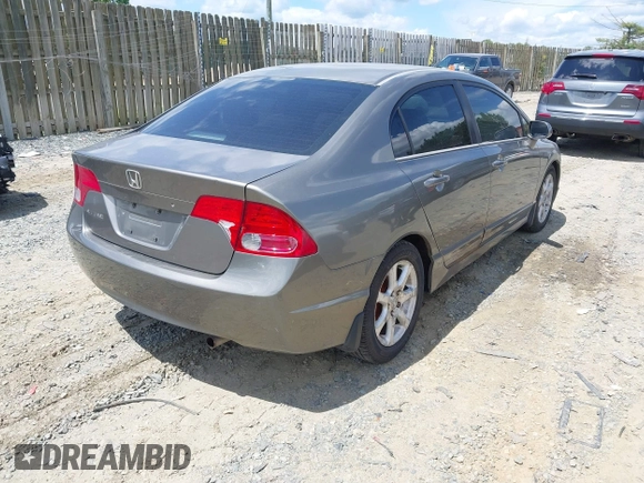 2006 Honda Civic LX with VIN 1HGFA16586L104230, listed as a IAAI auction lot 42215822 with 128,704 mi miles and . Bid and sale history available at DreamBid. Image 4.