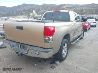 2007 Toyota Tundra SR5 with VIN 5TFRV54197X031872, listed as a IAAI auction lot 41593418 with 246,426 mi miles. Bid and sale history available at carsss.com. Image 4.